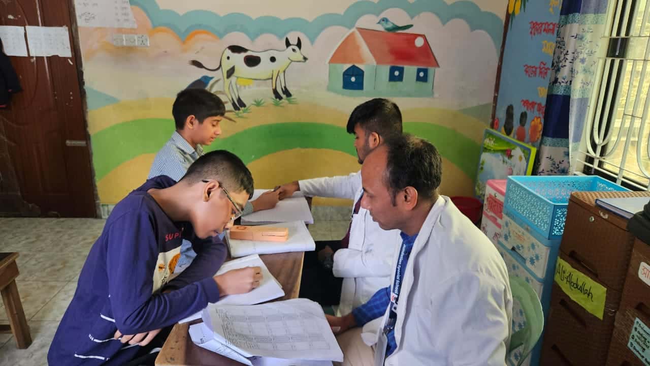 One-on-one ABA therapy session — therapist working closely with a child